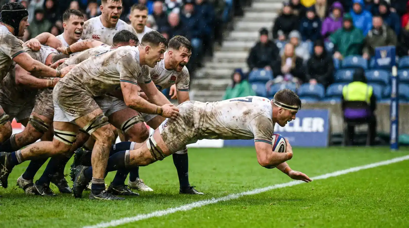 Loose forward scoring a try from a driving maul in professional rugby