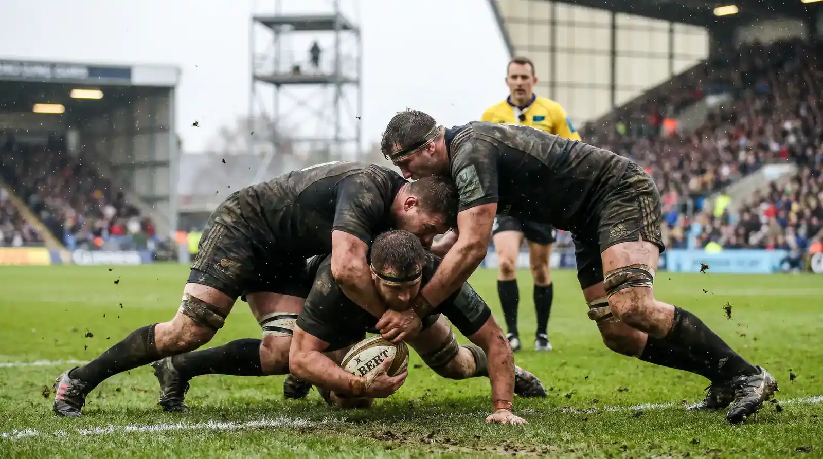 Split scene of a rugby union ruck and a rugby league tackle showing the pace difference between codes