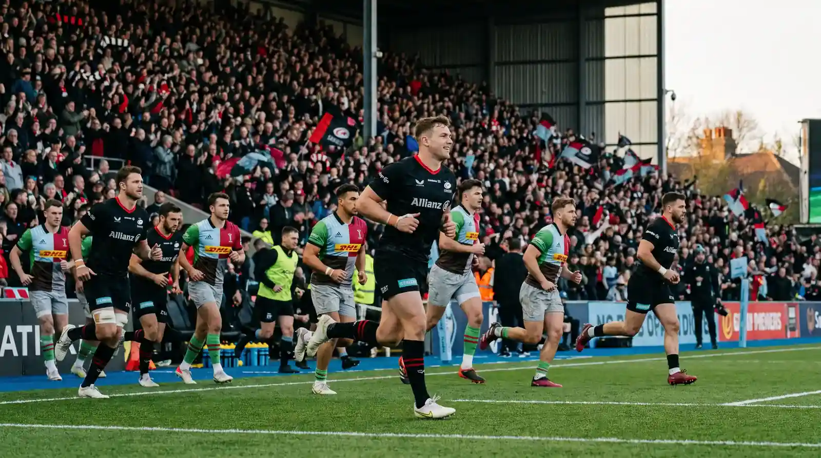 Fresh rugby substitutes entering the match in the second half