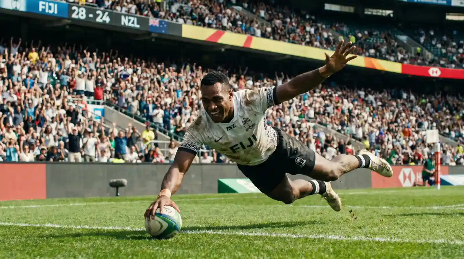 Sevens player celebrating a try scored in a fast-paced tournament match