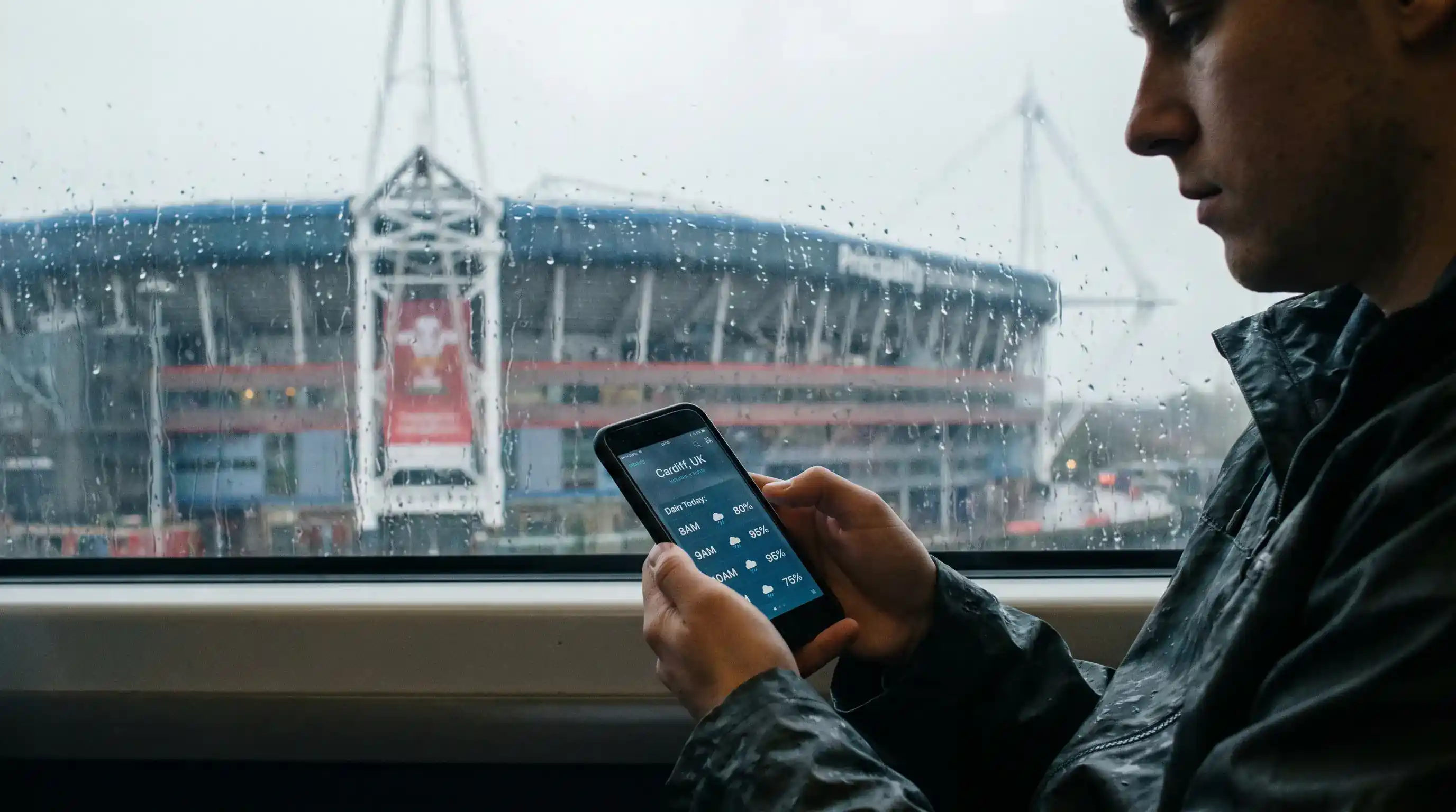 Match-day weather forecast checked on a phone hours before rugby kick-off